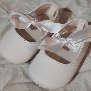 Pink baby shoes